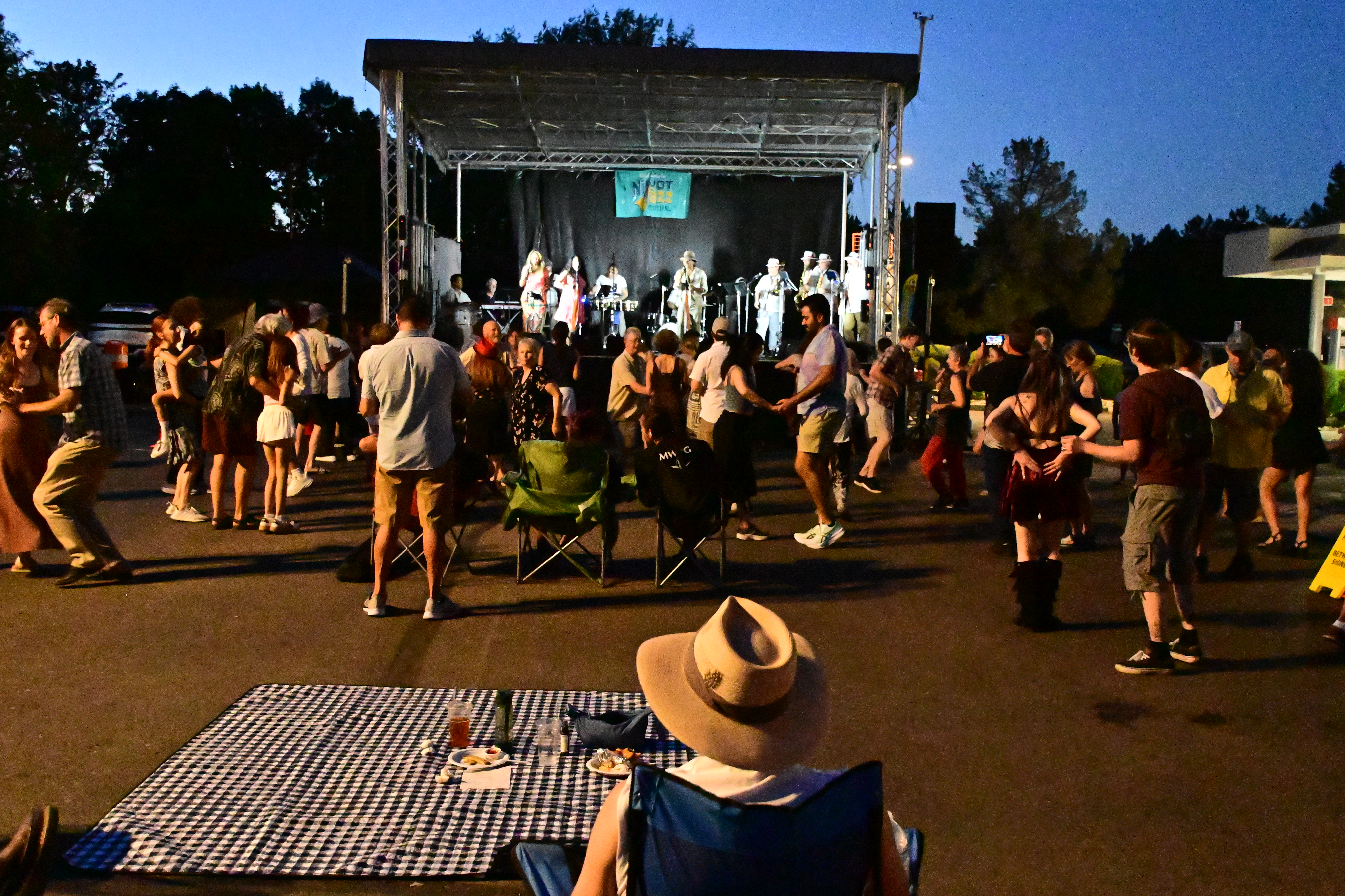 Quemando Performance plus full stage at night at the Niwot 2025 Jazz Festival